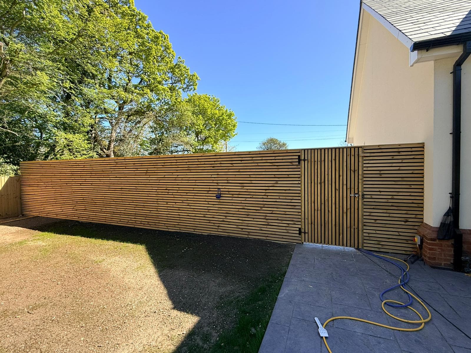 Slatted garden fencing installed in Chelmsford by TimBear Builds
